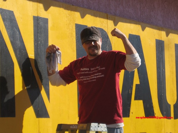 4409 bulging bicepts Ron Paul 2012 revolution continues sign making cottonwood Arizona